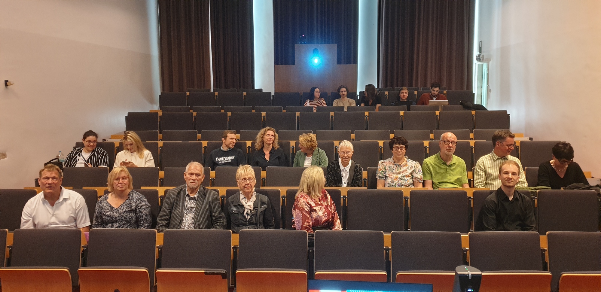 Slowly, the seats were filling up.