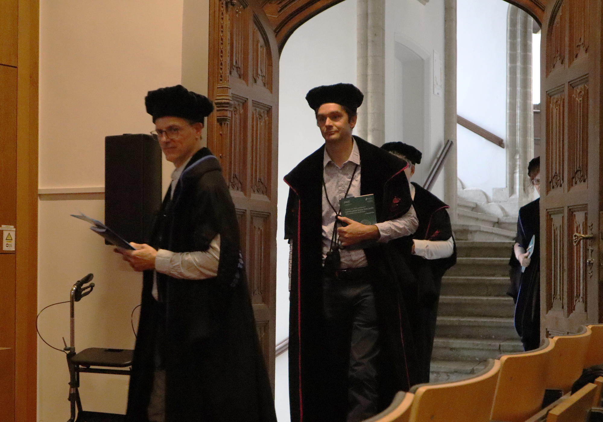 Right on time, the professors arrived.