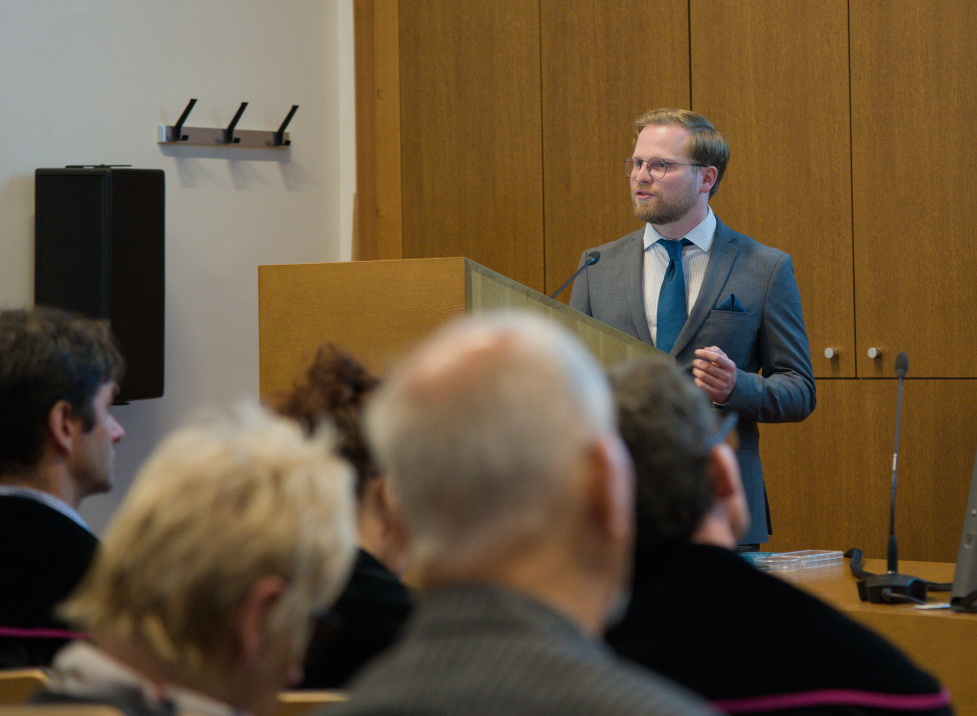 … I faced everyone behind a podium.