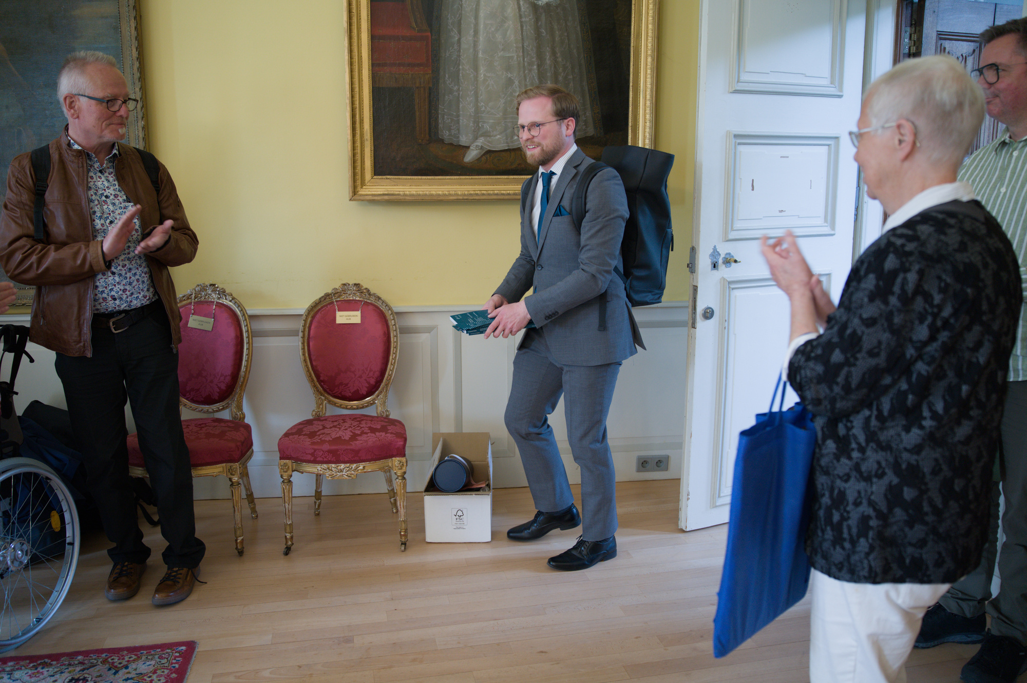 I was welcomed by applause in the ceremonial halls of the castle.